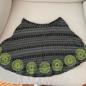 Embroidered mini skirt.